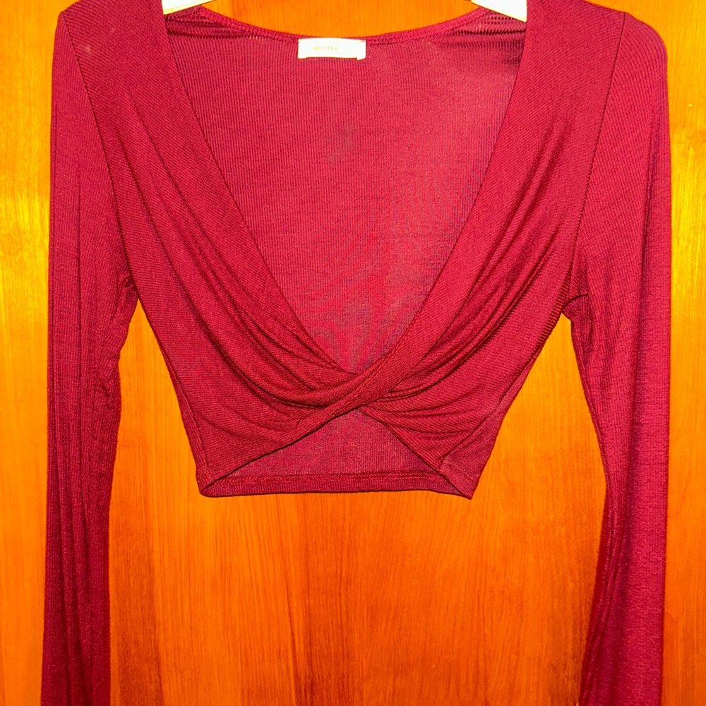 red cropped long sleeve plunging top